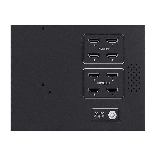 Close-up of the Feelworld F5 PRO V4 6" display panel with four HDMI inputs, four HDMI outputs, 12 V DC power supply and ventilation slots on a dark surface.
