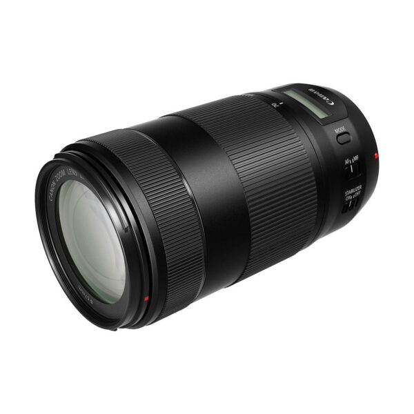 The black Canon EF 70-300mm f/4-5.6 IS II USM telephoto lens with textured grip, digital display and multiple control dials is shot at an angle against a white background.