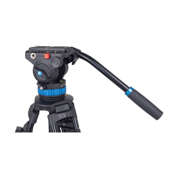 Close-up of the Sirui SH-15 video tripod head with black finish, long handle, blue control ring and several control knobs, mounted on a tripod.