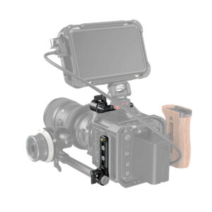 A professional video camera mount using the SmallRig 3011 Rod Clamp with NATO Rail with large screen, lens, tracking focus, wooden side handle, mounted cage and cable to connect camera to monitor.