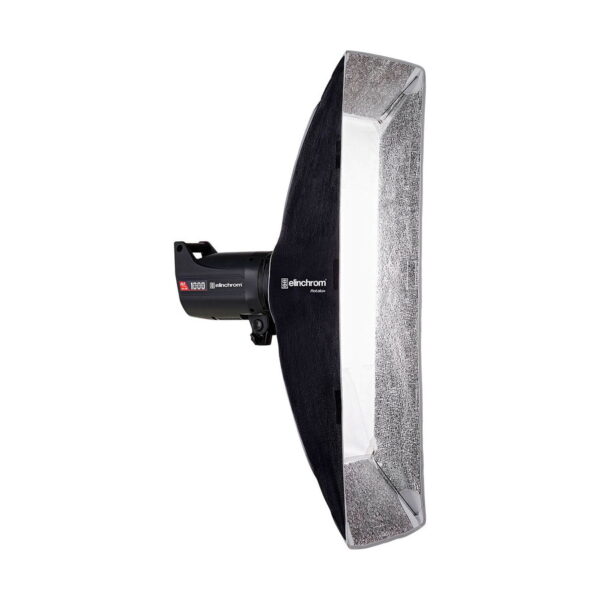 Elinchrom Rotalux Stripbox 35x100cm is a rectangular softbox with a black frame and reflective interior, mounted on an Elinchrom SK 1000 luminaire against a white background.