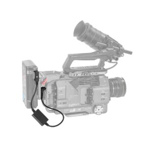SmallRig_2932_Sony_FX9_FX6_19_5V_Output_D-Tap_Power_Cable_002 Professional video camera with SmallRig 2932 Sony FX9 & FX6 19.5V D-Tap power cord and battery adapter in focus, with the rest of the camera hidden and less visible.
