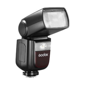 Musta Godox Ving V860 III TTL-salama Canon-kameroille, jossa on suorakulmainen, ylöspäin suuntautuva läpikuultava salamapää, metallinen kiinnitysteline pohjassa ja Godoxin logo näkyvissä etupuolella.