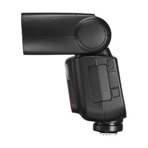 Godox Ving V860 III TTL -salama Nikon kameroille näkyy sivulta valkoista taustaa vasten, jolloin sen kallistusmekanismi ja ohjauspainikkeet paljastuvat.