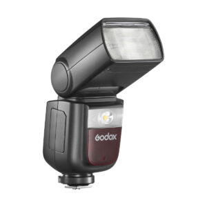 Musta Godox Ving V860 III TTL-salama Nikon-kameroille, jossa on suorakulmainen, ylöspäin taivutettu pää, läpikuultava kansi, ohjauspainikkeet ja jalkajalka, kuvassa valkoista taustaa vasten.
