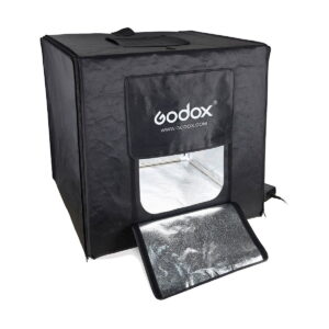 Godox_LST40_002 The black Godox LST40 - Photo Tent Portable Light Box has a reflective interior, an open front flap with the Godox logo and website, and a carrying handle on top.