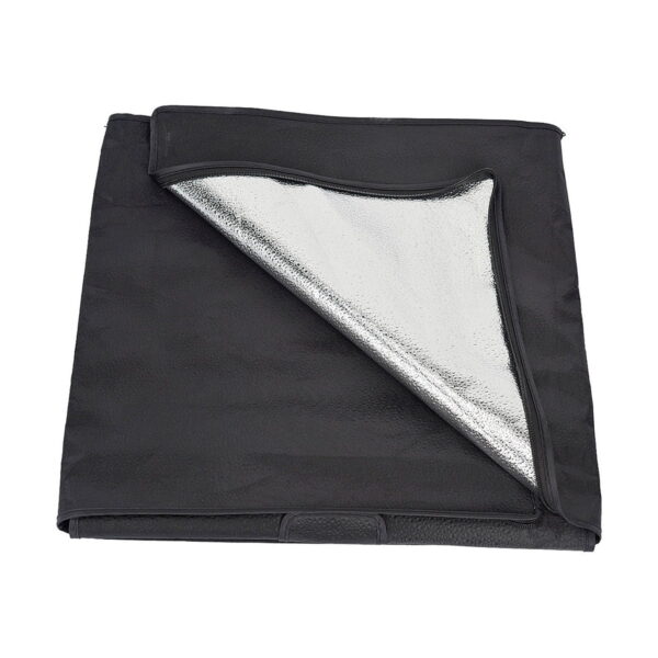 Godox_LST40_011 Godox LST40 - Shooting tent folded black carpet with one corner turned up to reveal its shiny silver reflective underside.