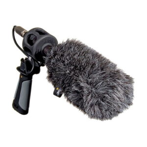 The Rode WS6 Deluxe Windscreen is a grey furry windscreen cover designed to fit handheld microphones with black handles, effectively reducing wind noise when recording outdoors.