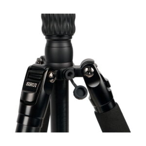 Close-up of the black Sirui Traveler 7VA tripod, highlighting the centre column, foot joints, control knobs and Sirui branding on the foot lock against a white background.