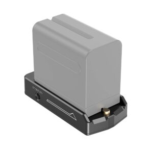 The SmallRig 3095 NP-F Battery Adapter Plate Lite with NP-FZ100 Dummy Battery is a grey rectangular battery with a black charging cradle, a white arrow and a DC OUT 12V port marked on the side.
