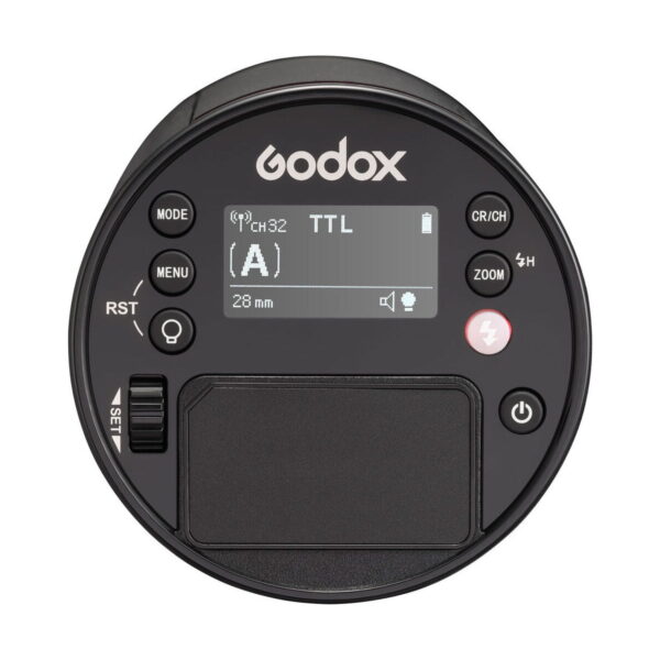 godox_ad100_pro_ttl_03 Yläkuvassa pyöreä Godox AD100 Pro TTL -akkusalama-salaman ohjausyksikkö, jossa on näyttö, painikkeita, valintakiekko ja merkittyjä ohjaimia tilalle, zoomille, valikolle ja virralle.