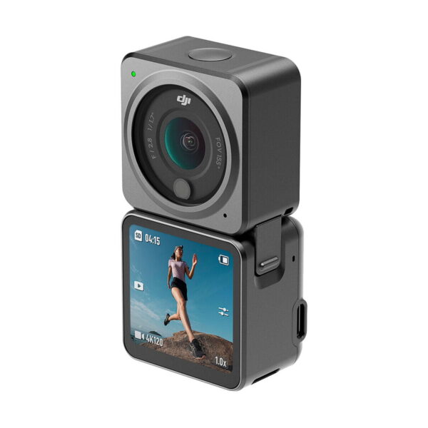 The DJI Action 2 Dual-Screen Combo action camera features a compact square-shaped lens module at the top and a touchscreen below, and captures a woman running outside under a bright blue sky.