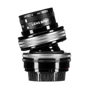 Lensbaby Composer Pro II + Sweet 80 for Sony E is shown in black with silver highlights, tilted on a white background. The aperture and focus rings on the camera lens are clearly visible.