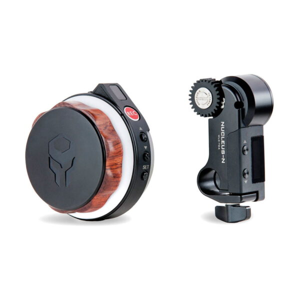 The Tilta Nucleus-Nano Wireless Focus Control System includes a wood-accented wireless controller (left) with knob and buttons, and a compact black motor unit with gear (right), both for precise lens control.