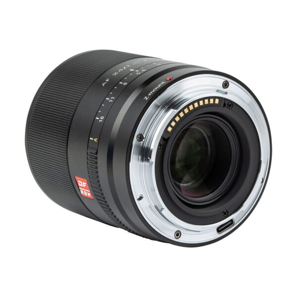 A close-up of the Viltrox AF 24mm f/1.8 lens for Nikon Z shows the metal lens mount, electronic contacts and focus/aperture markings in a black barrel with red DF and RF markings.