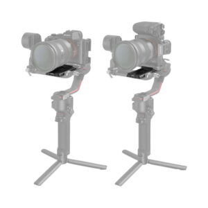 Two digital cameras on handheld tripod mounts are photographed side by side against a white background, partially faded to highlight the SmallRig 3061 QR plate on the Ron RS2/RSC2 mounting plates.