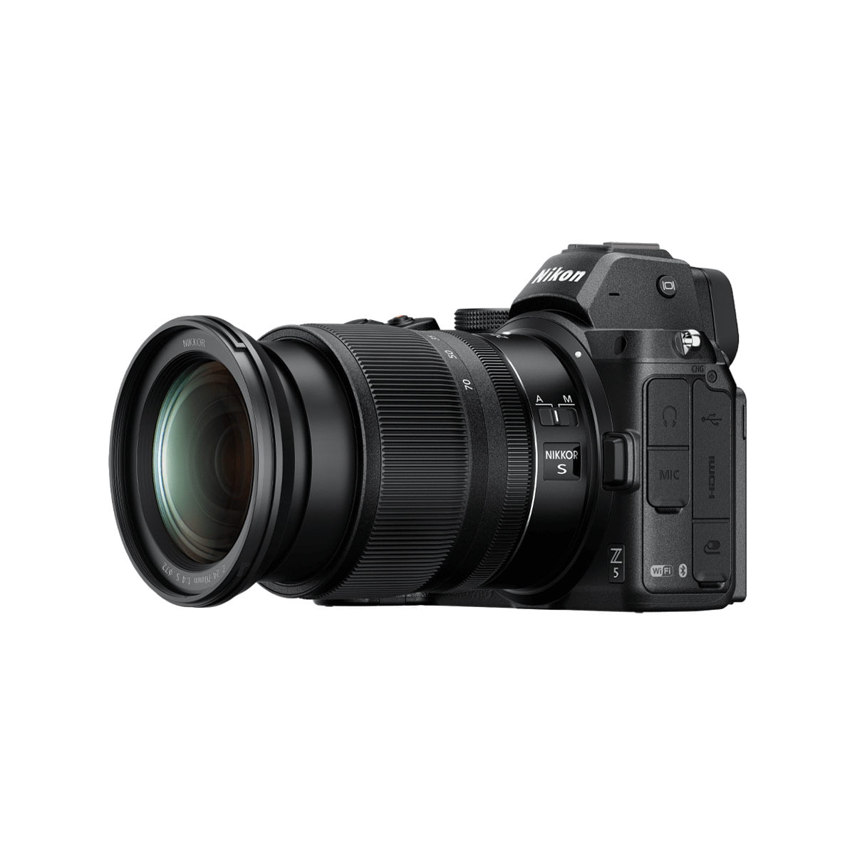 The Nikon Z5 camera with the Nikkor Z 24-70mm f/4 lens is shown tilted to the right on a white background, with various buttons and dials on the body.