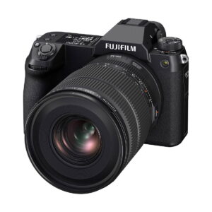 Close-up of the Fujifilm Fujino GF 20-35mm f/4 R WR lens mounted on the camera, highlighting its detailed buttons and controls against a white background.