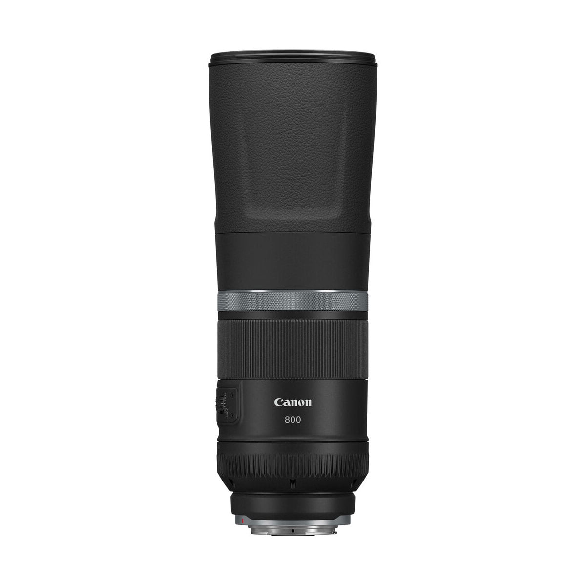 Musta Canon RF 800mm f/11 IS STM -teleobjektiivi seisoo pystyasennossa valkoisella taustalla, mikä korostaa sen kuvioitua kahvaa ja säätörenkaita.