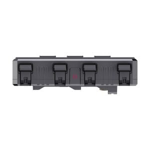 Etukuva Accsoon CineView Quad Transmission HDMI/SDI -laitteesta, harmaa suorakulmainen laite, jossa on neljä mustaa salpaa ja keskellä virtapainikkeen kuvake, eristettynä valkoiselle taustalle.