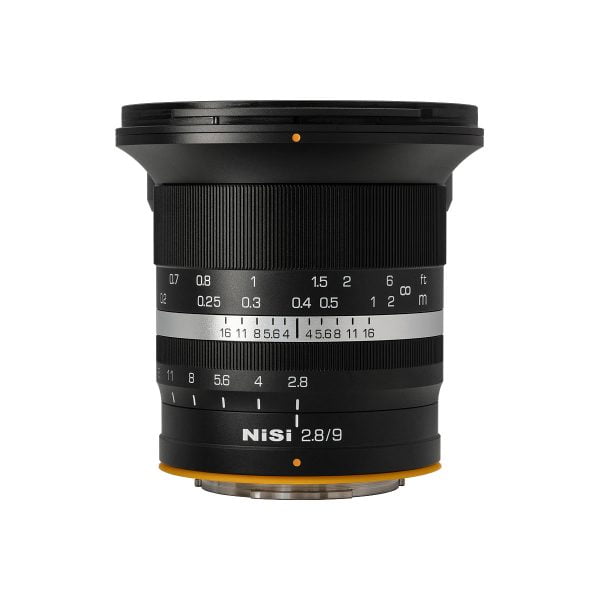 NiSi 9mm F2.8 - Fuji X lens, black with white focus and aperture markings, visible against a white background.