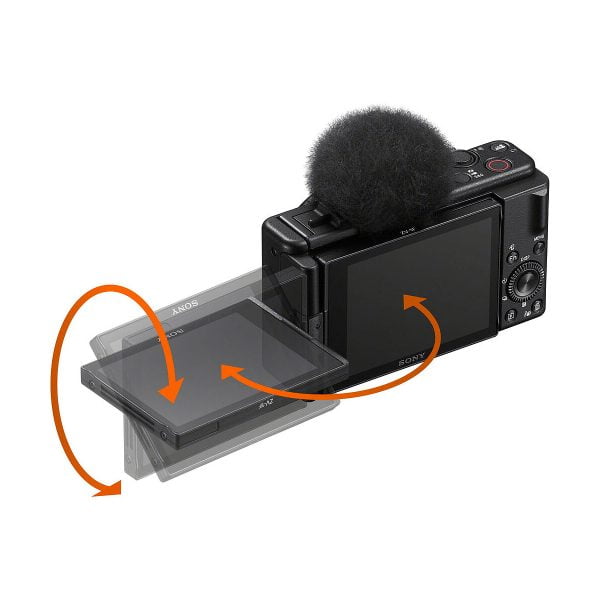 Sony ZV-1F -kompaktikamera on esitetty mustana, ja sen päällä on sumea mikrofoni, ja oranssit nuolet korostavat ulos käännettävän näytön pyörivää ja kallistettavaa liikettä.