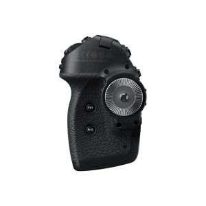 The Nikon MC-N10 Remote Control Handle is a black, textured camera control handle with two customizable Fn1 and Fn2 buttons, a large metal control dial and a visible upper label isolated on a white background.
