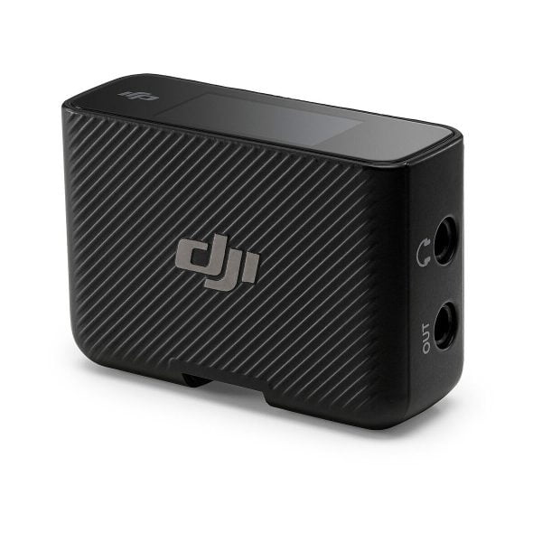 The DJI Mic Dual Kit wireless microphone system is a compact black transmitter with a textured diagonal striped design, two 3.5mm input/output ports, a small top screen and the DJI logo on the side.