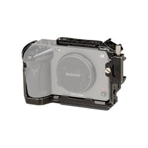 The SmallRig 4138 Cage for Sony FX30/FX3 attaches to a Sony Alpha full-frame mirrorless camera and provides protection and mounting support. The camera and cage are visible against a white background.
