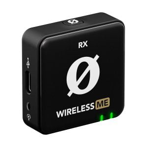 Rode_Wireless_ME_003 Rode Wireless ME -langaton mikrofonijärjestelmä on musta langaton vastaanotin, jossa on merkinnät RX ja WIRELESS ME Ø-logolla, kaksi vihreää LEDiä, USB-C-portti ja 3,5 mm:n ääniliitäntä sivulla.
