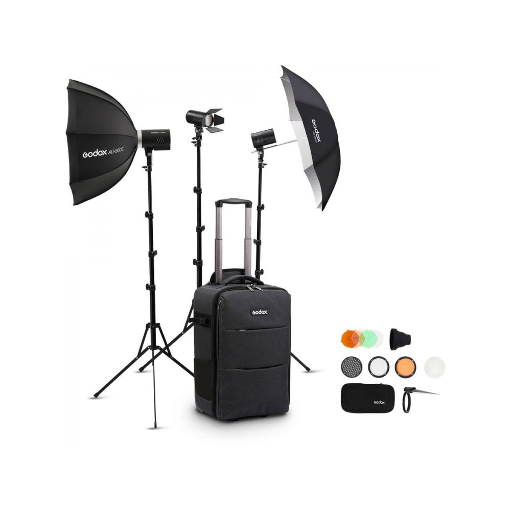 The Godox AD-K1 Three Light Kit (AD300Pro & 2xAD100Pro) includes softboxes with tripods, a rolling case, light modifiers, umbrellas and accessories, all displayed on a white background.