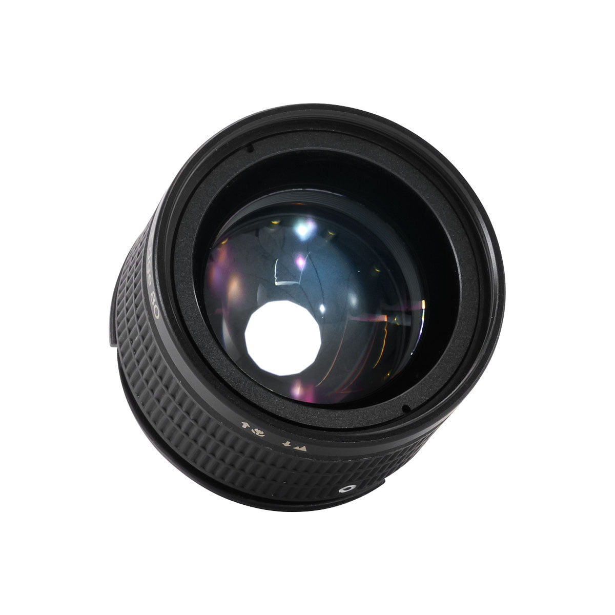 Lensbaby Edge 80 Optic on musta kameran objektiivi, jonka lasielementit ja aukkoterät paljastuvat ylhäältä katsottuna valkoista taustaa vasten.