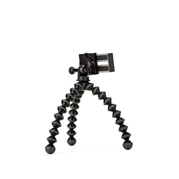 JOBY GripTight GorillaPod Stand PRO Jalusta Puhelimelle, joustava musta kolmijalka, jossa on taivutettavat jalat ja älypuhelimen pidike, seisoo pystyssä valkoisella pohjalla.