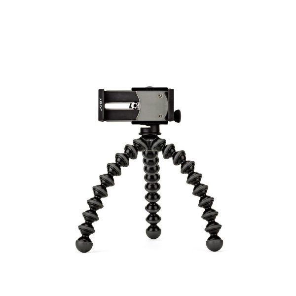 JOBY GripTight GorillaPod Stand PRO Jalusta Puhelimelle on pieni, musta joustava kolmijalka, jossa on segmentoidut, taivutettavat jalat ja älypuhelimen pidike, kuvassa valkoista taustaa vasten.