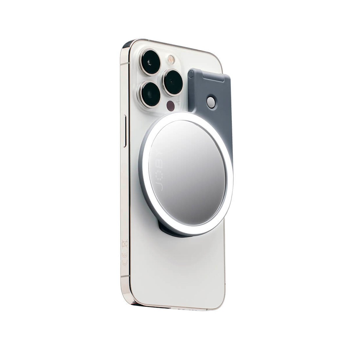 Joby Beamo Ring Light for MagSafe - Harmaa on valkoinen älypuhelimen lisävaruste, jossa on valaistu magneettirengas ja harmaa klipsi parempaa valaistusta varten valokuvissa tai videopuheluissa.