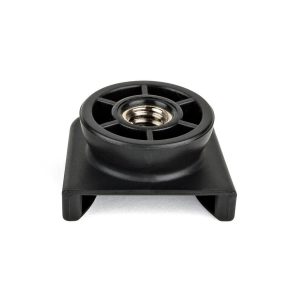 Joby Cold Shoe Mount, black plastic bracket with threaded metal insert in the middle, front picture in white. The base has two angled feet; the top has a circular opening.