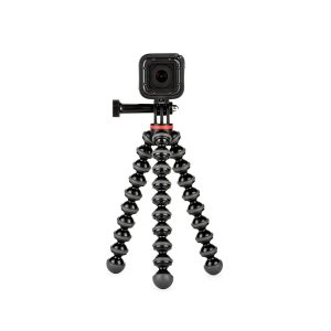 JOBY GorillaPod 500 Action Jalusta Musta/Harmaa, pieni musta toimintakamera, joka on asennettu sen joustaviin, segmentoituihin jalustajalkoihin, on aseteltu valkoista taustaa vasten.