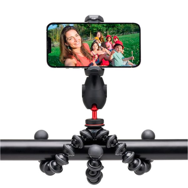 Joby-GripTight-Pro-3-kit-5 A group selfie is taken outdoors on the green lawn with a smartphone attached to a horizontal pole with a Joby GripTight Pro 3 Kit - a phone stand that is mounted flexibly.