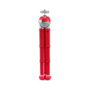 Joby PodZilla Flexible Tripod Kit M Punainen on kompakti, harmaan ja punaisen värinen, kameroille tai älypuhelimille suunniteltu, harmailla ja punaisilla jaloilla ja kiinnitysruuvilla varustettu jalusta, joka seisoo pystyssä valkoista taustaa vasten.