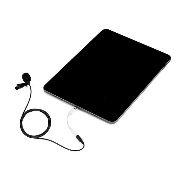 The black tablet lies flat on a white surface, and the Joby Wavo Lav Microphone is connected to it with a cable and adapter.