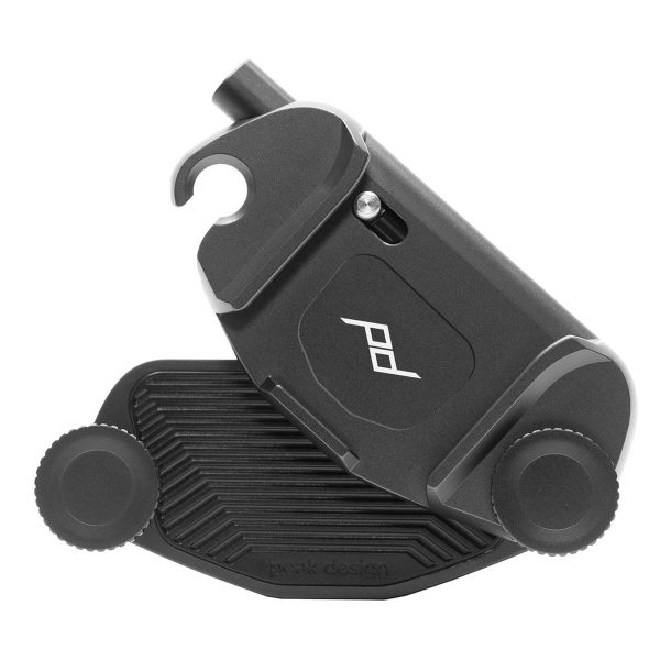 Peak Design Capture (clip only) - Black is a black and silver camera clip with two control knobs and logo, designed to securely attach your camera to a belt or strap.