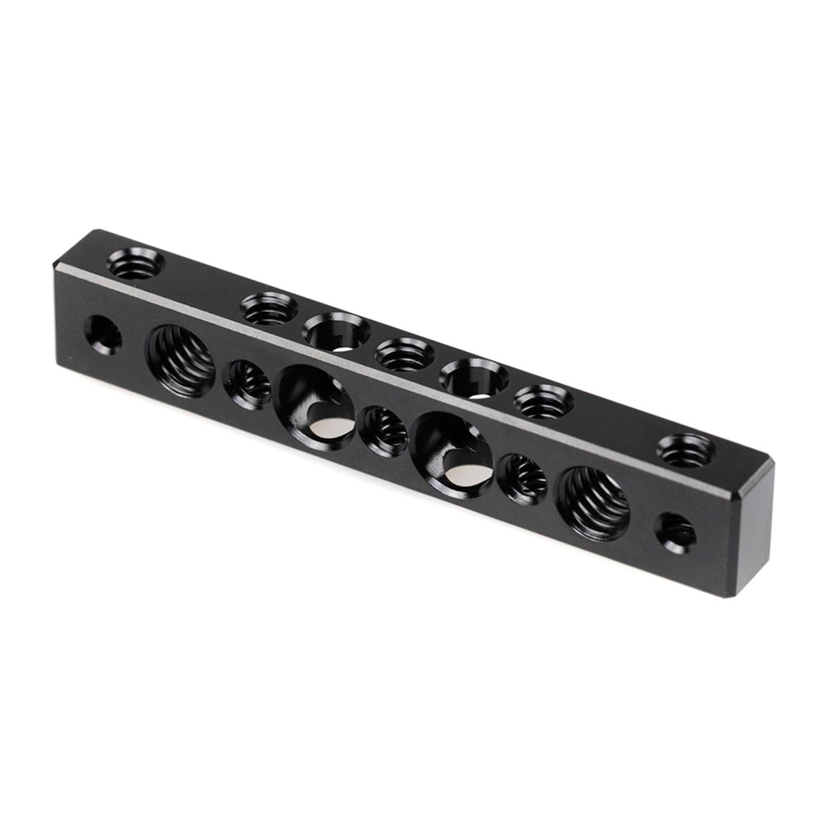 The SmallRig 1091 Cheese Bar features a black rectangular metal construction with multiple 1/4" and 3/8" threaded holes and round slots, ideal for mounting or connecting mechanical components.