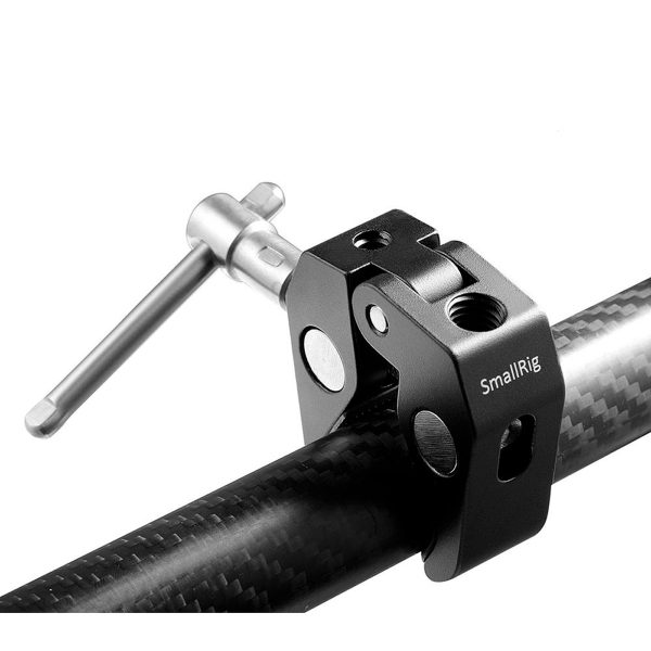 The black SmallRig 2058 Super Clamp with silver handle is attached to a carbon fibre rod for attaching camera accessories; it has 1/4" and 3/8" threads.