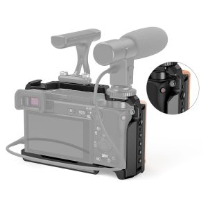The SmallRig 2310 Cage for Sony A6100/6300/6400/6500 is pictured from the rear, with the controls in the top right corner of the cage highlighted in the close-up.
