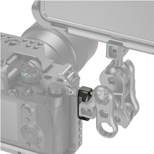 Camera mounted on SmallRig 2501 Nato Rail 35mm w/ ARRI Locating Screw with adjustable metal arm and clamp, showing detailed connection points and camera controls.