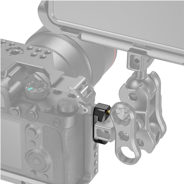 Camera mounted on SmallRig 2501 Nato Rail 35mm w/ ARRI Locating Screw with adjustable metal arm and clamp, showing detailed connection points and camera controls.