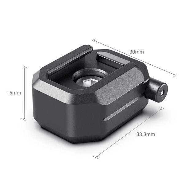 SmallRig-2797-3 SmallRig 2797 Multifunction Cold Shoe Mount w/ Safety Release on musta, suorakulmainen kameran lisävaruste (30mm x 15mm x 33,3mm), jossa on pyöristetyt reunat, keskellä oleva aukko ja sylinterinmuotoinen sivukiinnike.