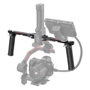 The SmallRig 3027 Dual Handgrip is shown mounted on the DJI RS2/RSC2/RS3/RS3 Pro gimbal, with the camera, monitor and cables in a semi-transparent overlay to illustrate the complete setup.