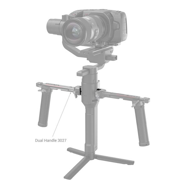The camera is mounted on a handheld gimbal stabilizer with two side handles and is equipped with a grey SmallRig 3032 NATO Rail for the DJI Ron RS2/RSC2. The dual handle 3027 and accessories are shown in grey.