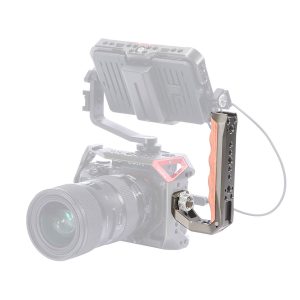 The SmallRig 3131 Professional Cage Kit for the Fujifilm X-T4, with external monitor and metal and wooden side grip mounted, is shown on a white background with the camera and monitor semi-transparent to highlight the grip.